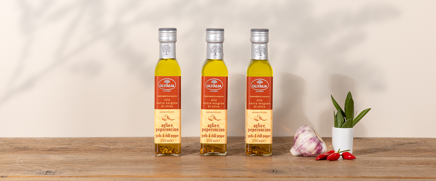 Condimento a base di olio extra vergine di oliva aromatizzato all’aglio e peperoncino - 3 bottiglie 1